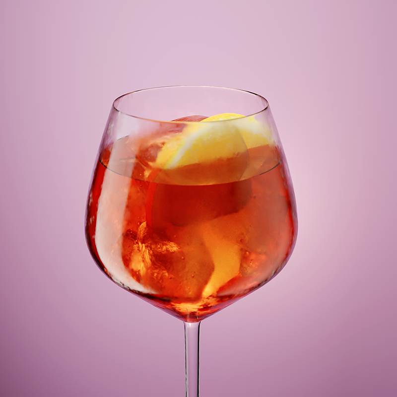 A Close-Up Of Cold Glass Of Aperol Spritz With Condensed Surface